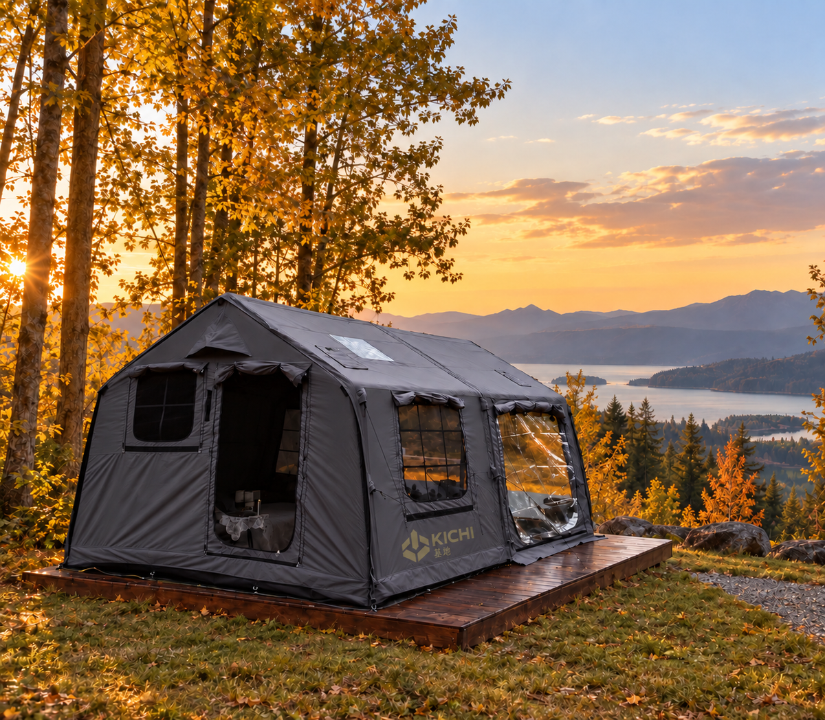 KICHI air-frame tent shelter pitched on a wooden platform overlooking a mountain lake at sunset
